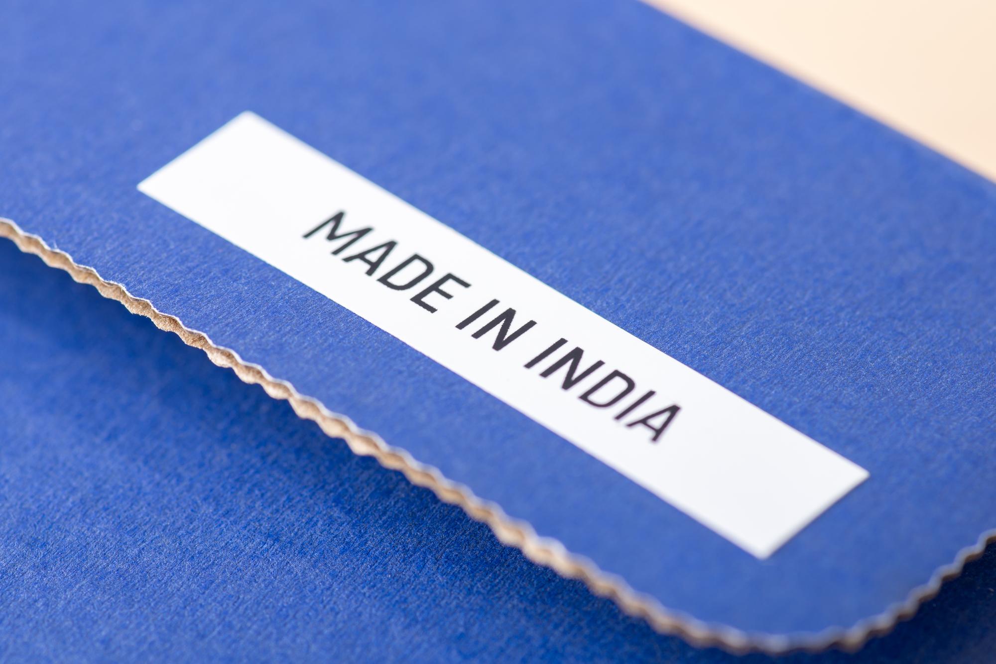 packaging label with embroidered seal